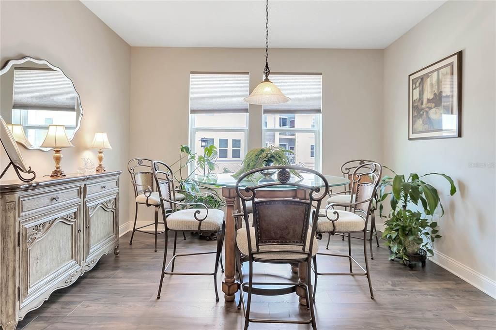 Entertaining friends and family is easy with your choice of formal dining or casual dining off the kitchen in front of 4 of the seemingly endless windows in this home!