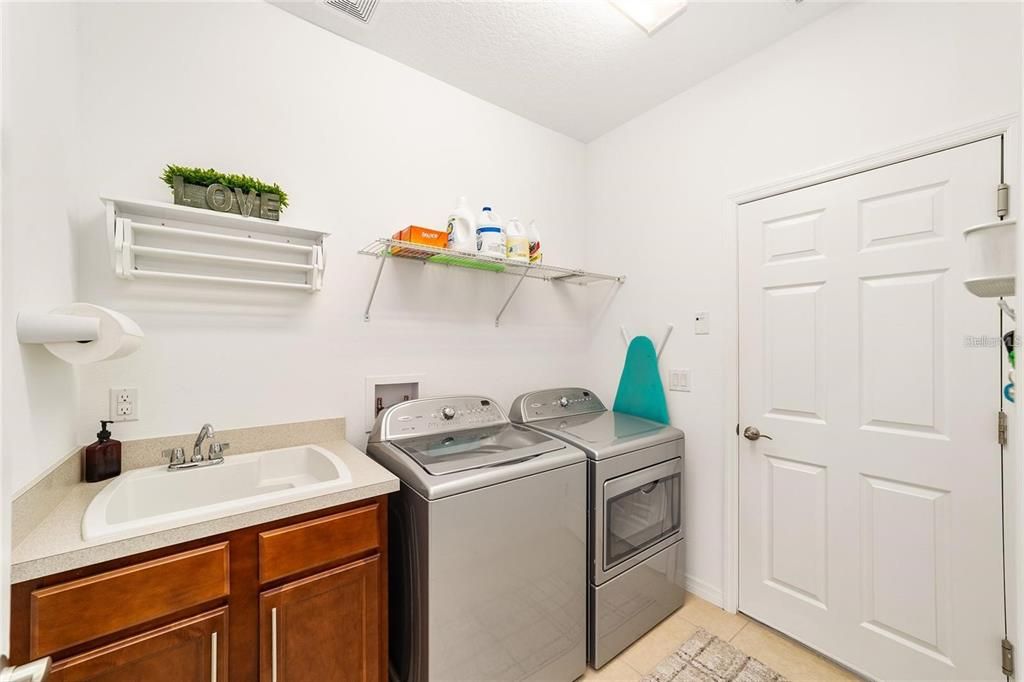 Laundry Room and door into 2 car garage