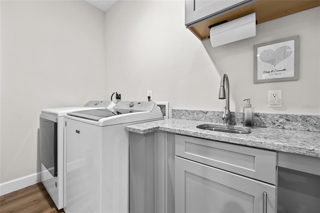 Laundry Room With Sink & Built In Cabinets