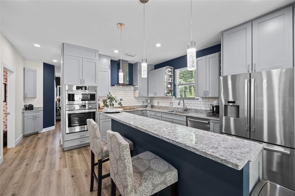 Kitchen- Granite Countertops, Bosch Appliances, Allen and Roth cabinetry