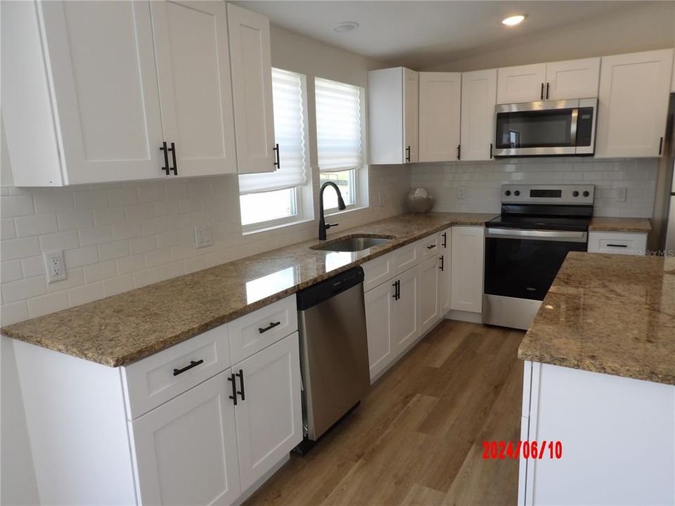 Remodeled Kitchen.  Wood CabinetsNew Stainless Steel Appliances