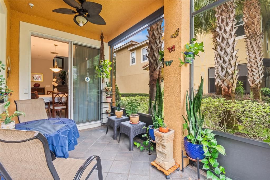 Beautiful porch area with lovely landscaping.