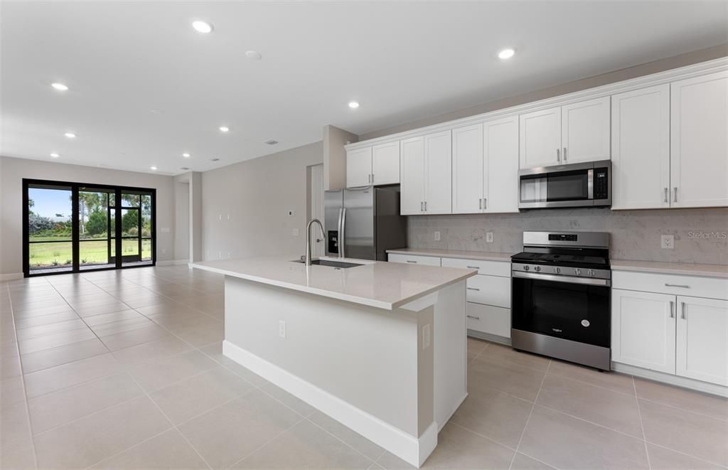 Kitchen open to gathering room.