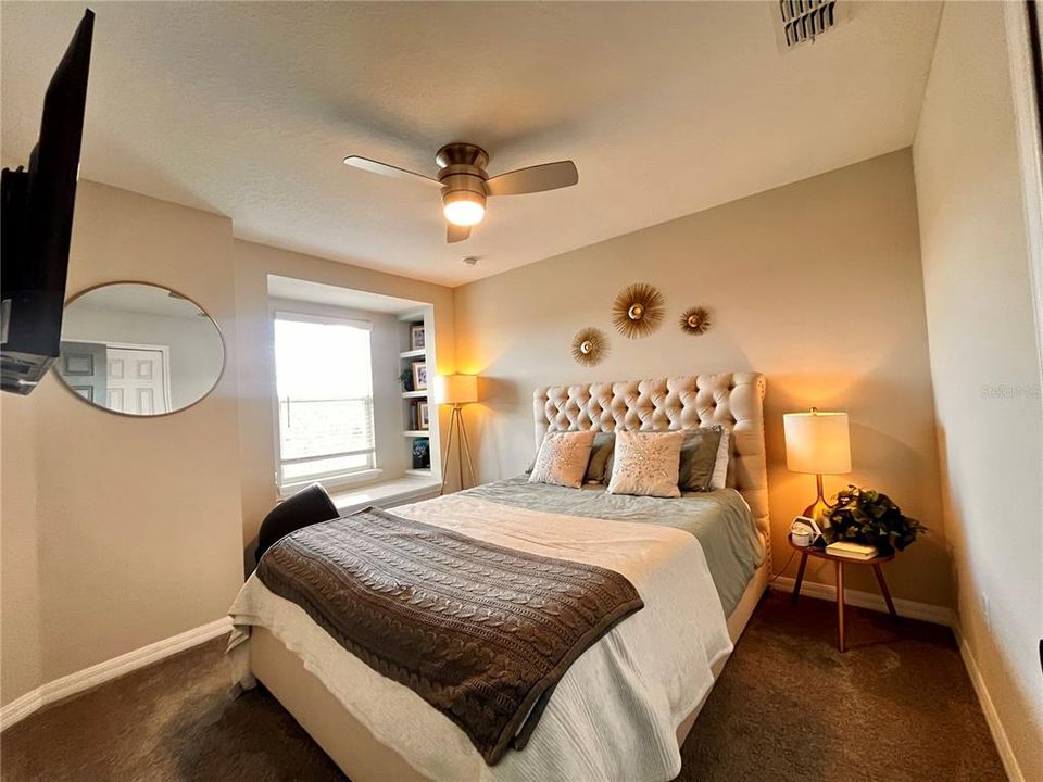 Bedroom Two with Built in Window Bench and Book Case