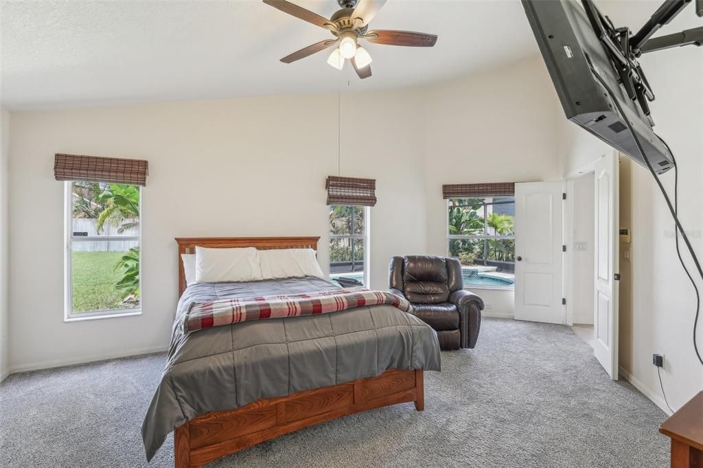 Large Primary Bedroom with direct access to the pool