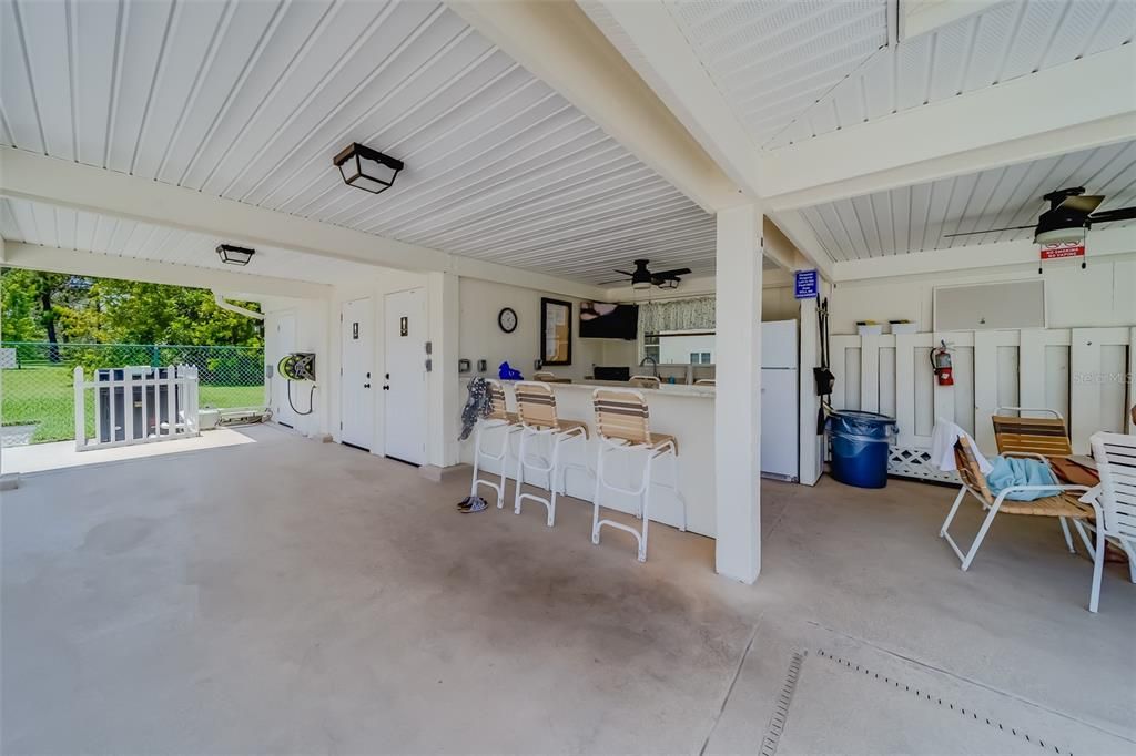 Outdoor kitchen and private bathrooms