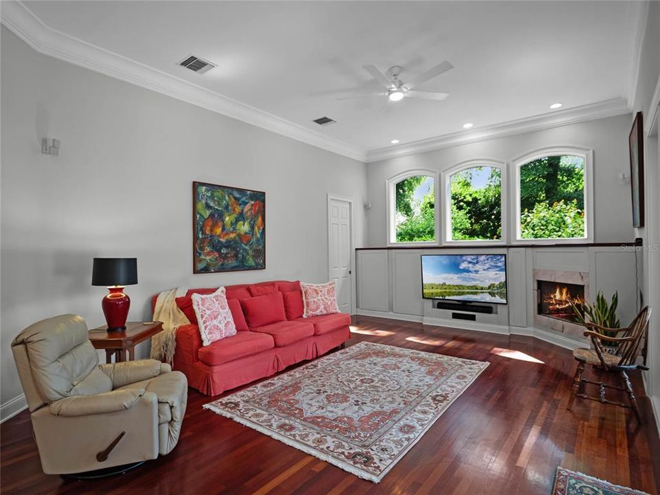 Family room is light and bright and easy access to the summer kitchen and pool area.