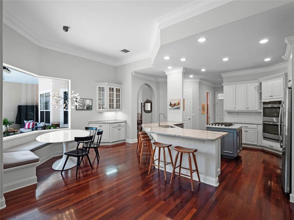 Remodeled kitchen featuring hardwood flooring