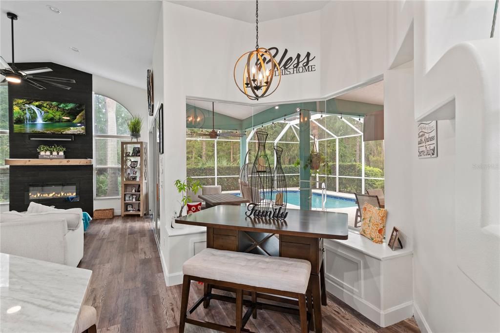 Breakfast nook with custom built bench overlooking pool