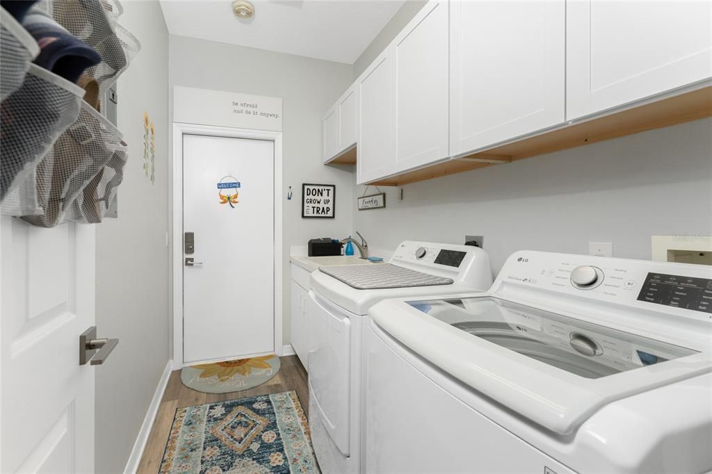 Laundry room off kitchen from garage