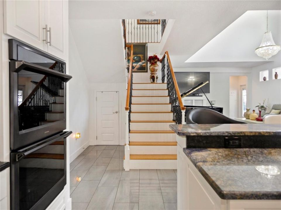 View Of Stairs From Kitchen