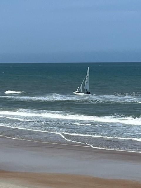 Ocean with sailboat