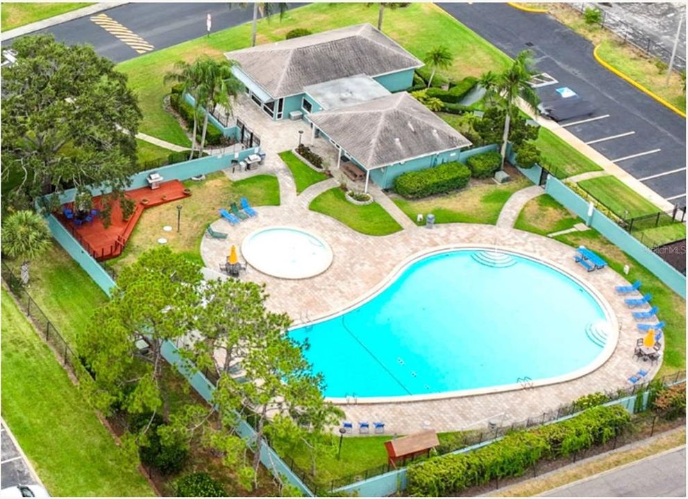 Pool and kiddie pool with party deck and BBQ