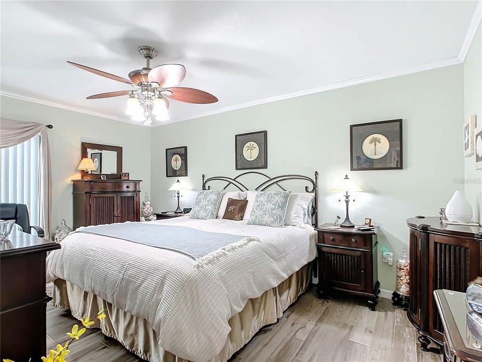 Primary Bedroom w/ walk-in closet, large enough for your king size bed, dressers and a desk.