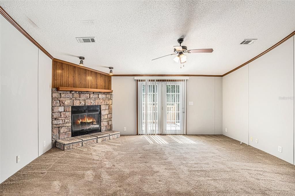 Family Room with Wood Burning Fireplace