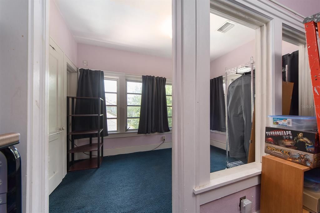 looking from upper middle bedroom towards rear bedroom with its own separate entrance