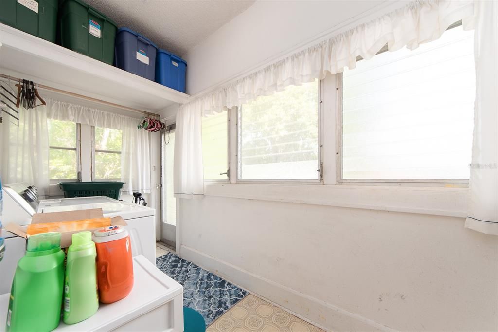 Upstairs Laundry room and private entrance