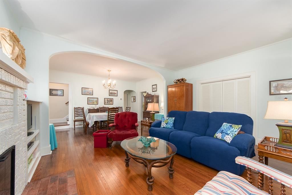 Looking from front of home towards dining room with stairs to second floor on left.