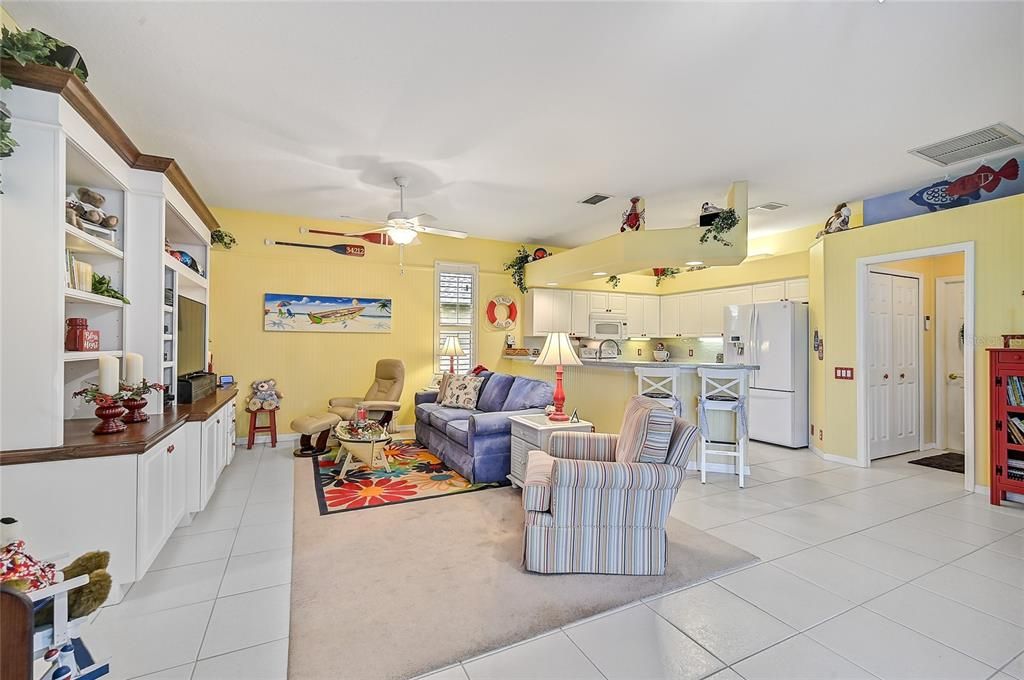 View from sliding door looking toward family room and kitchen; laundry room is to the right with access to garage.