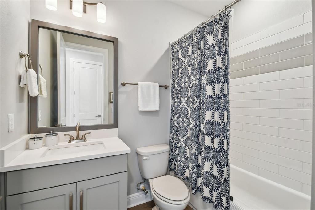 Shared Hall Full Bath with Tub/Shower Combo