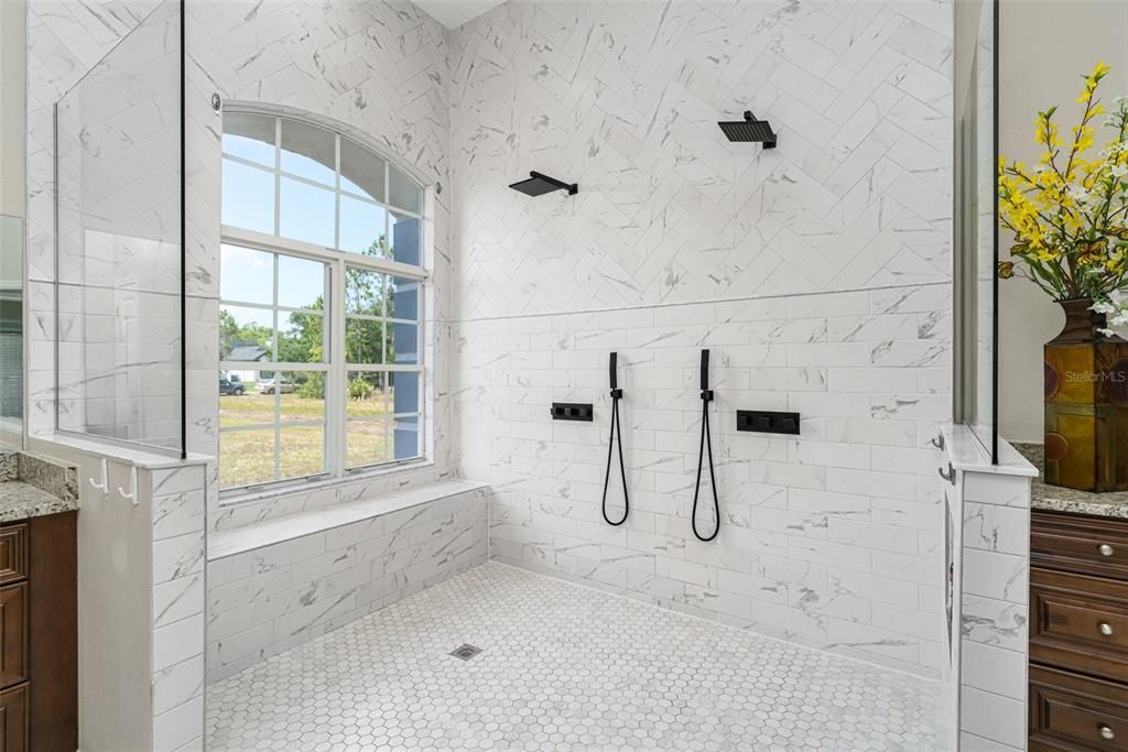 Owners bathroom double shower heads