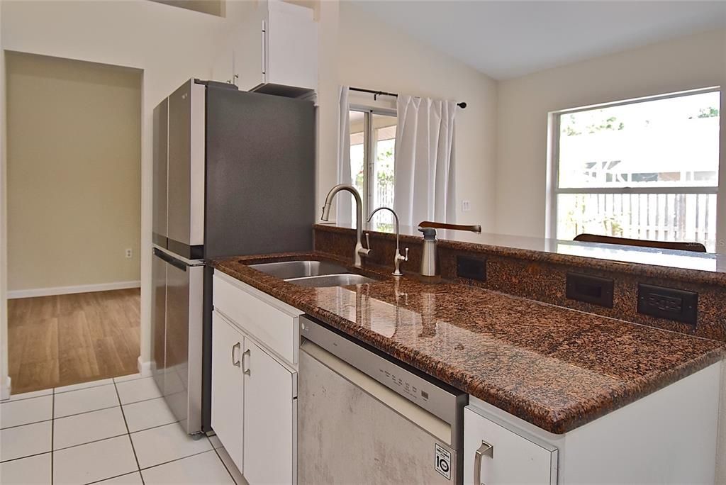 Eating Space in Kitchen off of Lanai | 5620 Wilde Oak Way, Sarasota, FL 34232