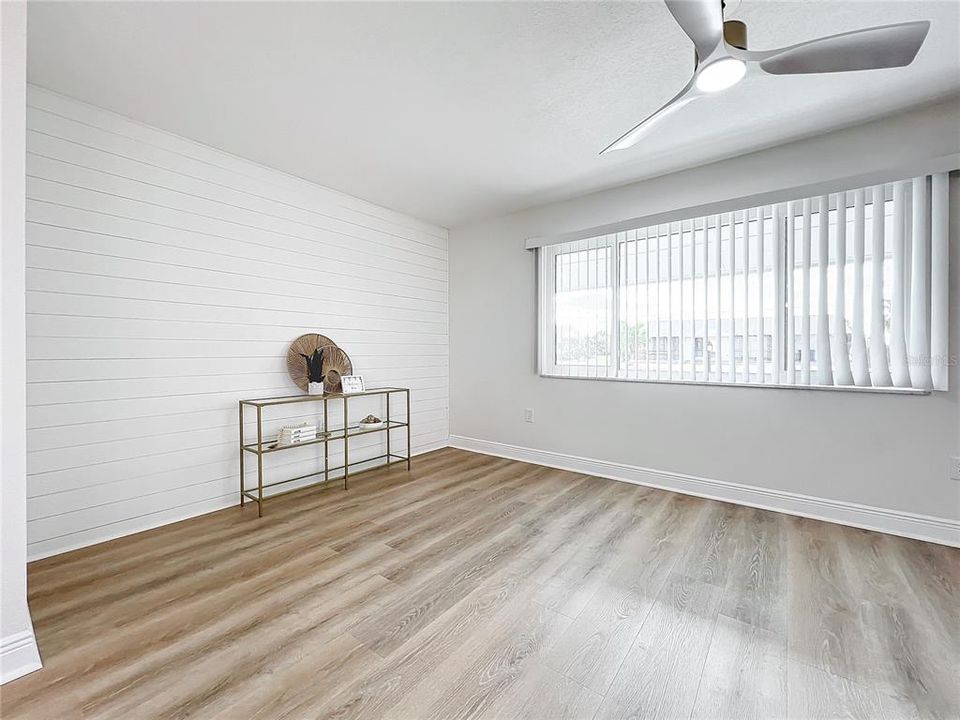 LIVING ROOM WITH CUSTOM SHIPLAP WALL