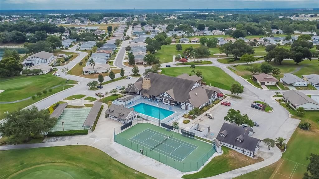 CLUBHOUSE AND COMMUNITY AMENITIES INCLUDING POOL, SHUFFLEBOARD, TENNIS COURT AND PICKLEBALL