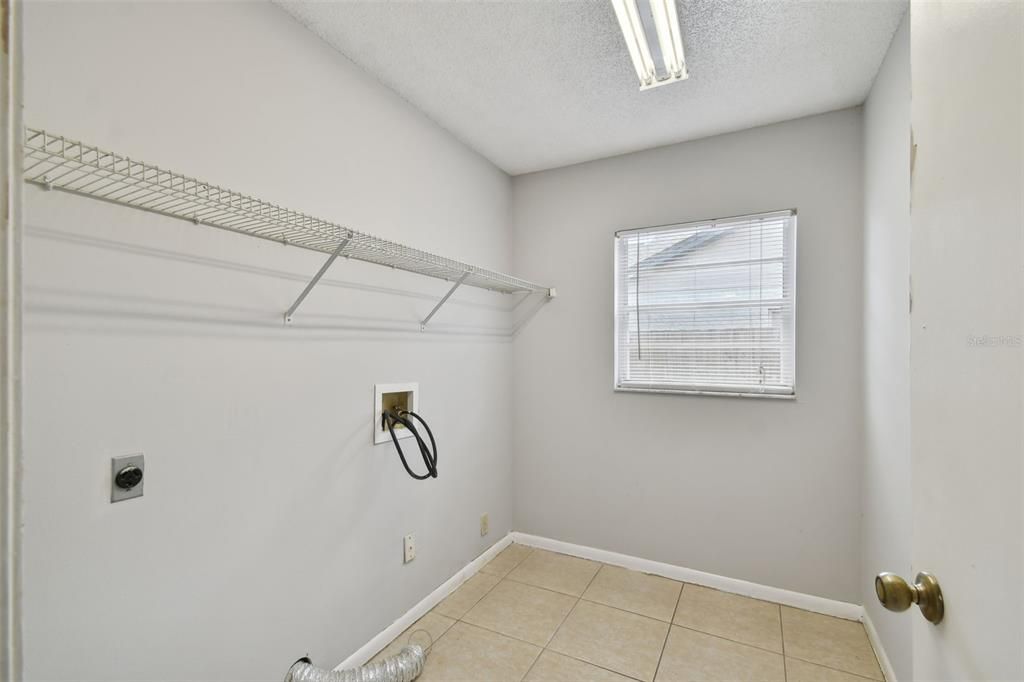 Laundry room with washer/dryer hood up