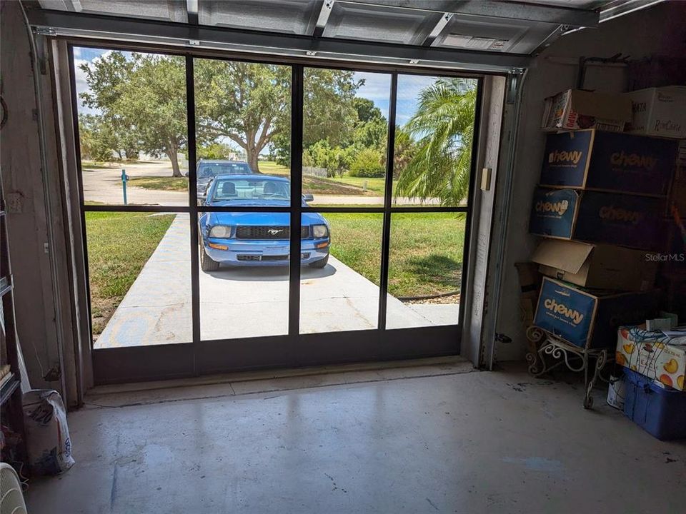 garage screen door looking out