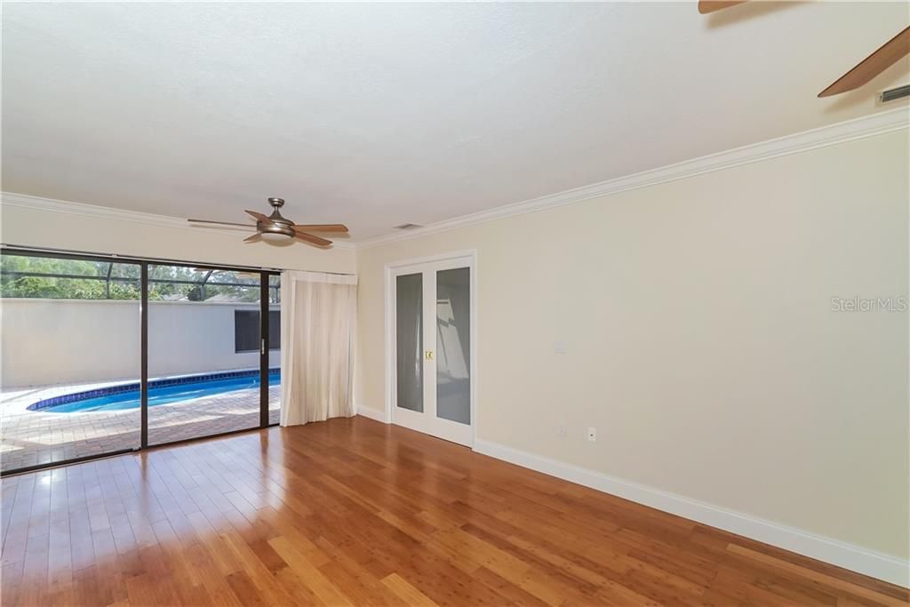 Huge Master bedroom with bamboo floors