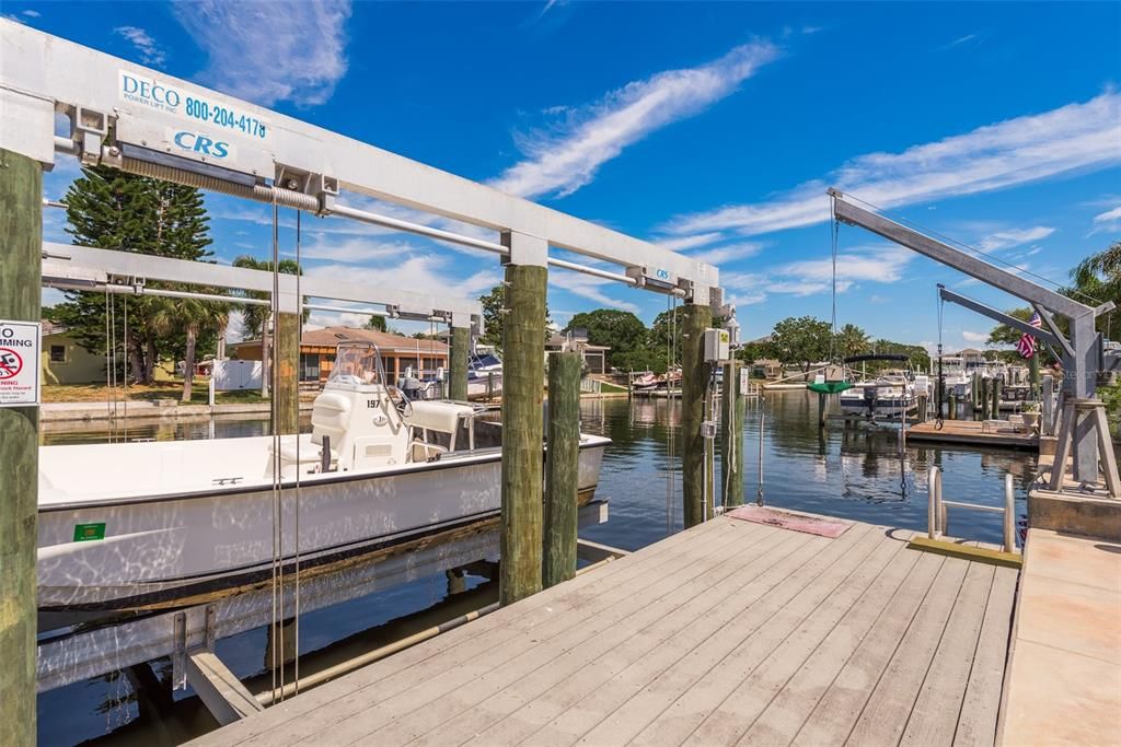 As an added bonus, this dock boasts 70 feet of seawall, a 20,000 lb boat lift, and reinforced dock pilings, ensuring both convenience and durability for your waterfront lifestyle. Don't forget the fillet table, perfect for preparing your fresh catch right at the dock, adding a touch of convenience and functionality to your waterfront experience.