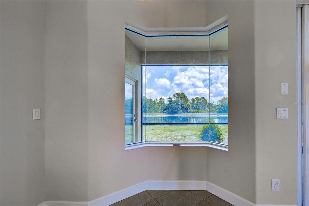 The unique aquarium window is a perfect setting in the dining area.