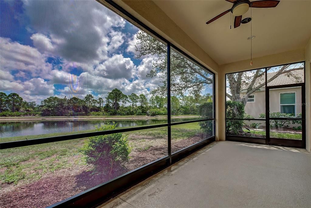 The large screened lanai has plenty of room for outdoor furniture, including a table and chairs for entertaining when the weather is right.  The view is fantastic.