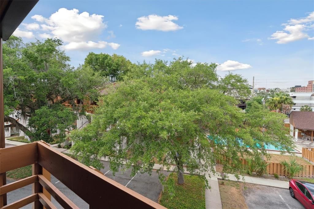 View of the community pool from the second bedroom's balcony.