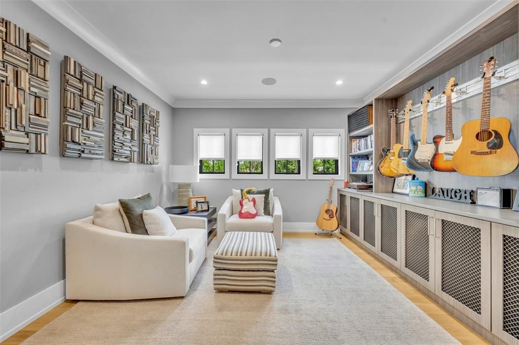 Upstairs office is currently being used as a music room