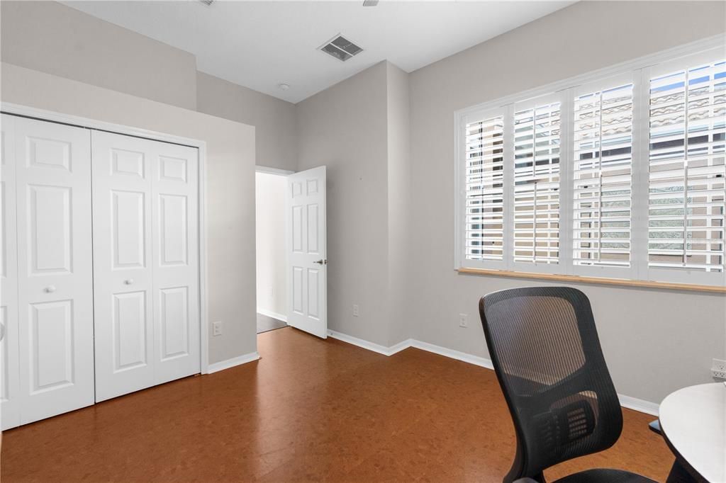 Bedroom Downstairs/ shows the closet/Sellers used as an office