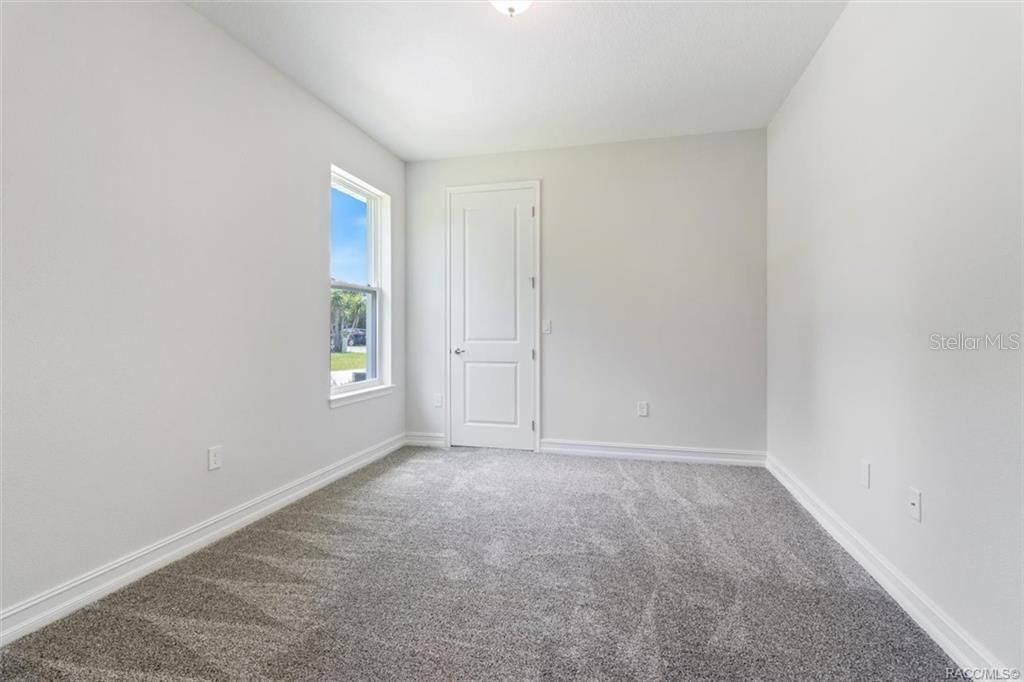 Hallway to 2nd and 3rd bedrooms