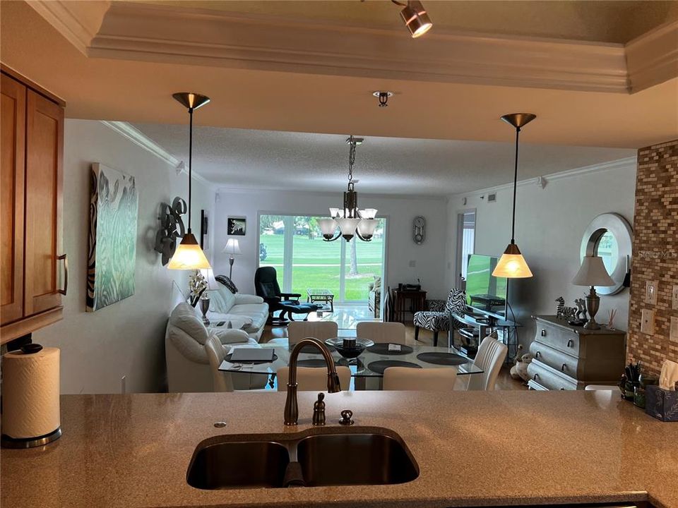 Kitchen with view into the dining room/living room