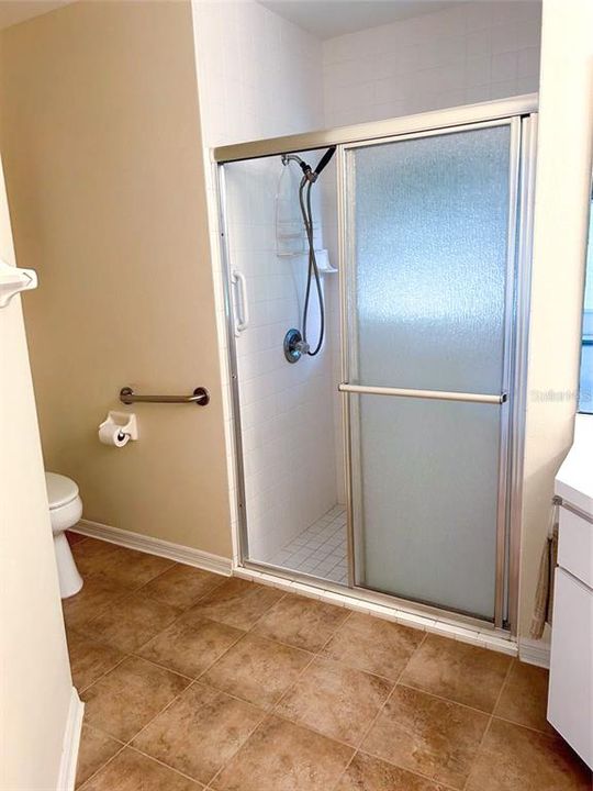 Primary shower with glass door