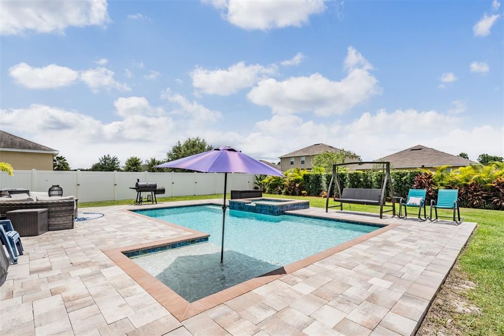 PAVER deck around this stunning OUTDOOR OASIS!