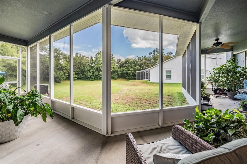 Screened  lanai overlooking backyard