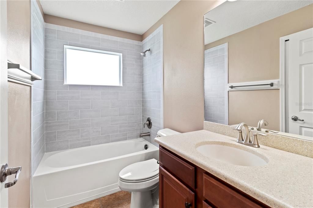 guest bathroom upstairs, by bedroom 2