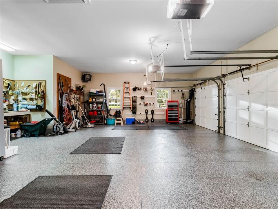 Oversized 3 car garage with workbench.