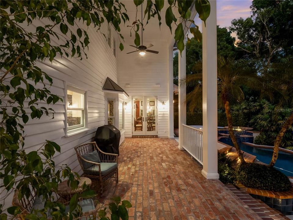 Twilight of the expansive covered porch.