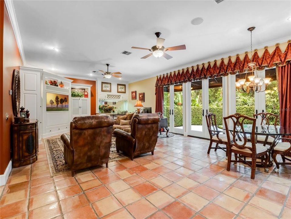 Family room overlooking the private backyard and pool area.