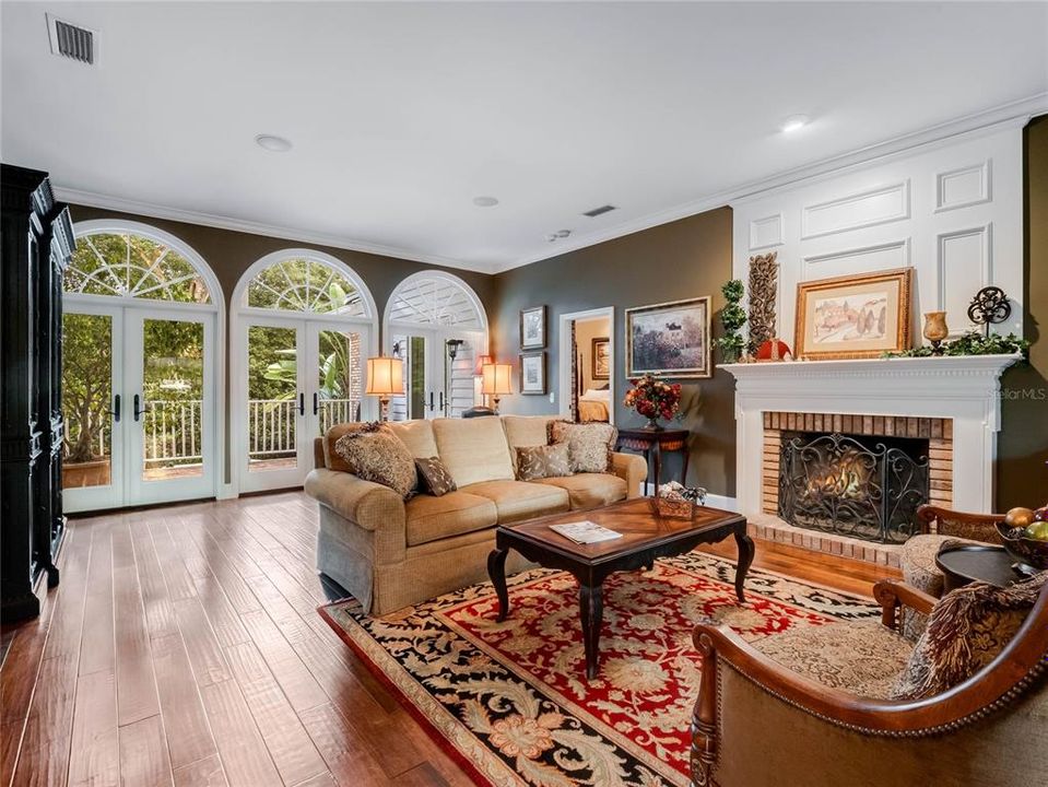 Living room overlooking the private backyard and pool.