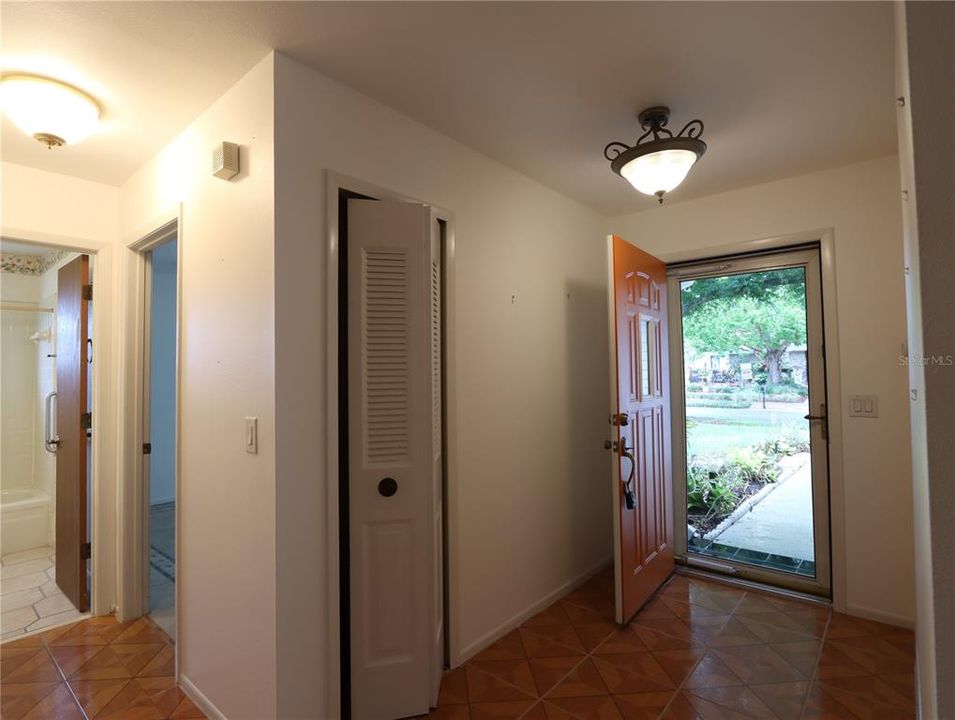 Entrance & hallway to guest bath and bedroom 2