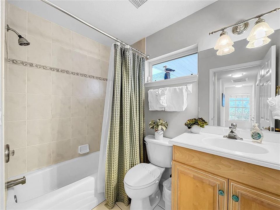 Guest bathroom with tub/shower combo