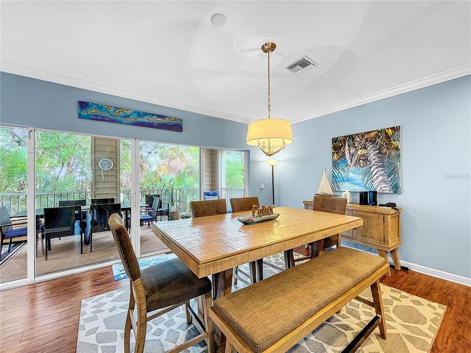 Dining area with large, screened lanai just beyond